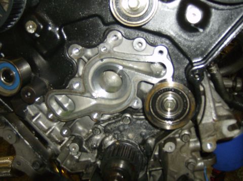1996 Ford Probe - Engine water pump assembly detail with pulleys and associated components.