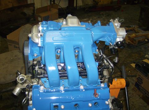 1996 Ford Probe - Engine assembly with blue painted intake manifold and turbocharger components.