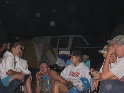 1974 Ford F-100 - Camping trip with friends, a tent and a van in the background.