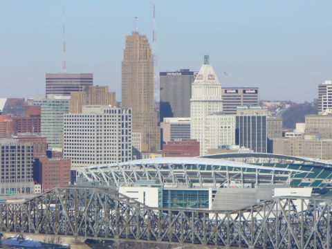 1991 Ford Probe - View of downtown Cincinnati, Ohio, a stadium and a large bridge over the river.