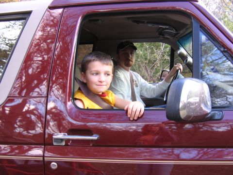 1996 Ford Bronco - Father and son ride in a 1996 Ford Bronco, enjoying a drive.