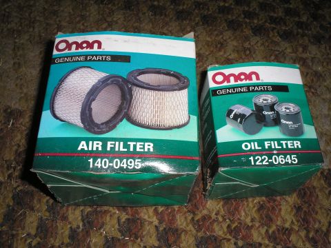 1990 Ford Bronco - Two boxes of Onan genuine parts, one for an air filter and one for an oil filter, are displayed on a textured surface.