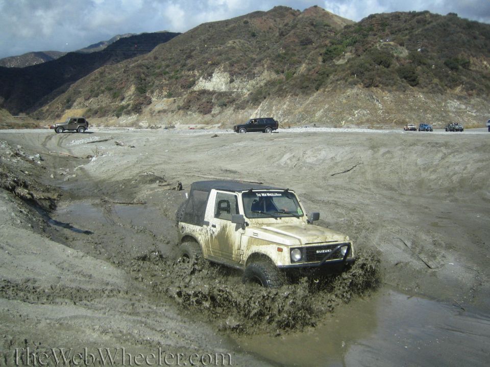 1987 Suzuki Samurai stuck in mud, front view