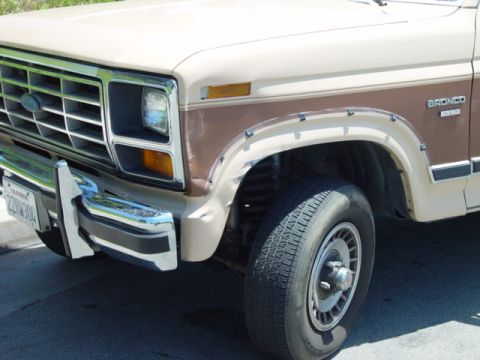 1986 Ford Bronco - As you can see the chrome ripped off. Im concidering not putting it back on and taking off all the chrome and side molding. Would it look g…