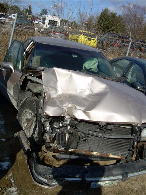 1966 Land Rover Discovery - This car sustained severe front-end damage, with airbags deployed, in a junkyard setting.