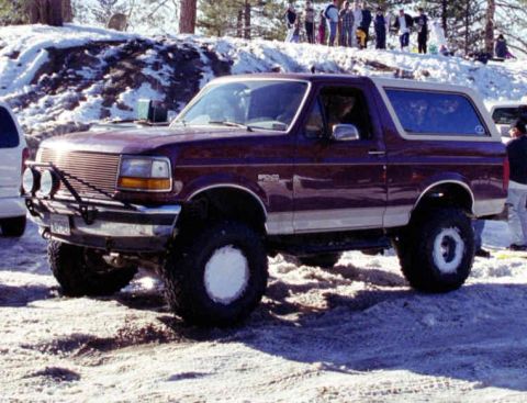 1993 Ford Bronco - This 1993 Ford Bronco is shown with modifications in a snowy outdoor setting.