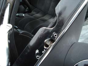 1992 Ford Crown Victoria - Close-up view of a car's interior, focusing on the door panel and seating area.