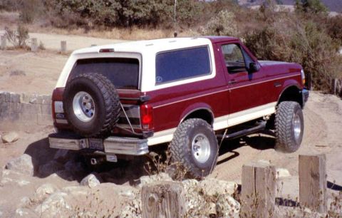 1993 Ford Bronco - This 1993 Ford Bronco is shown off-roading on a rocky terrain.