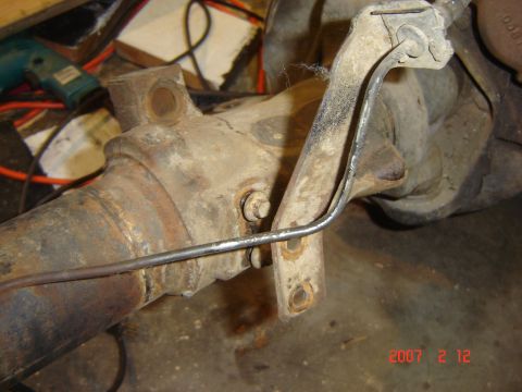 1993 Ford Bronco - Rear axle assembly with brake line bracket, likely from an older truck or SUV.