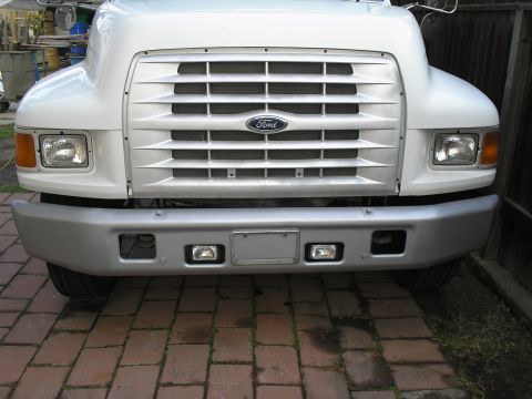 1999 Ford F-800 - Bumper and driving lights installed.
