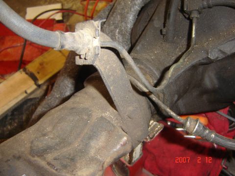 1993 Ford Bronco - Close-up view of vehicle brake lines and suspension components, with a timestamp indicating the photo was taken in 2007.