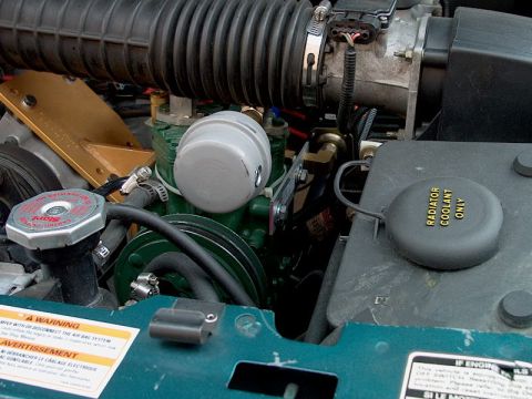 1996 Ford Bronco - Front view of air filter. Air manifold bracket on drivers side of York.