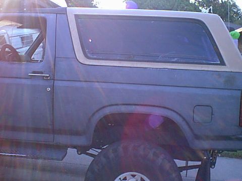1983 Ford Bronco - here is the drivers side with the old tint on.