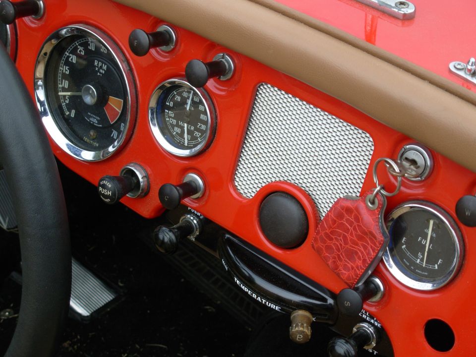 The car is idling in every photo in this album, but it's visible here in the gauges.