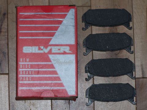 1995 Ford Probe - New disc brake pads in original packaging, with brand name 'Silver' visible.