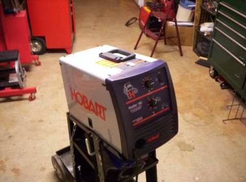 1995 Ford Bronco - A Hobart Handler 180 welding machine is shown on a cart in a workshop setting.