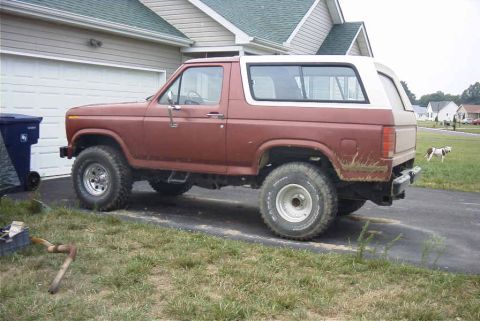 1980 Ford Bronco - This 1980 Ford Bronco is parked in a driveway next to a garage.