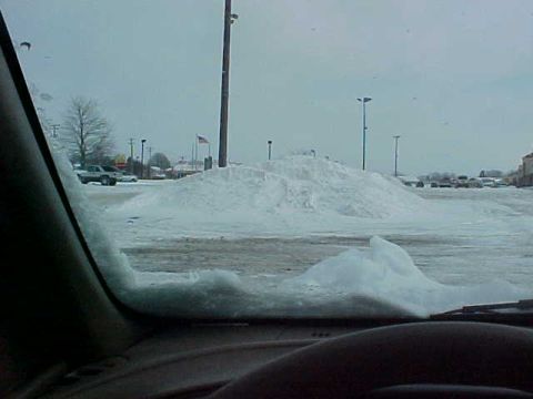 1995 Ford Taurus - Snow Drift in Hartville Shopping center parking lot