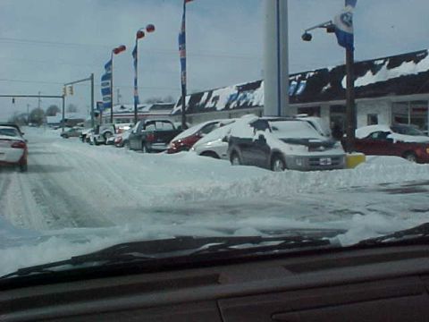 1995 Ford Taurus - Ford Dealer in hartville, before pic was taken, several cars in lot were barely noticible due to their entire front end was part of a snow…