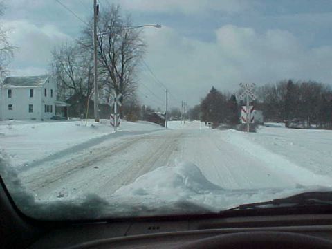 1995 Ford Taurus - Railroad crossing, the railway was completely covered in snow and barely noticible
