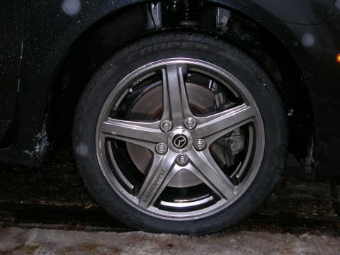 1994 Ford Probe - Wheel and tire detail, showing the alloy rim and brake components.