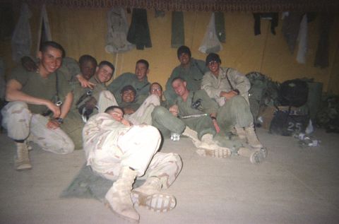 1979 Chevrolet Blazer - A group of soldiers pose for a photo inside a tent, with gear and bags visible in the background.