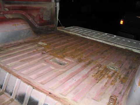 1979 Ford Bronco - slightly rusted back. No holes though.