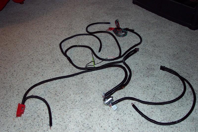 Vehicle wiring harness laid out on carpet