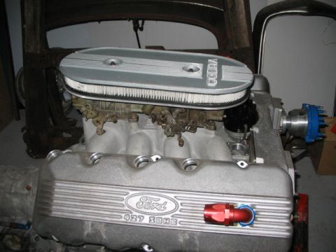1964 Ford 427 - A Ford 427 SOHC engine is shown with a Cobra air cleaner and prominent Ford branding.