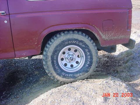 1980 Ford Bronco - and of course the rear tire stuffed on the hill