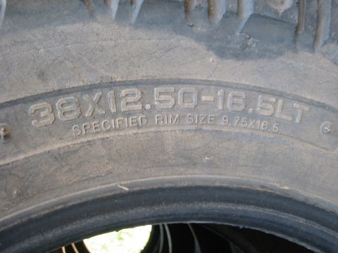 1966 Ford Bronco - Close-up of tire sidewall with size and rim specifications clearly visible.