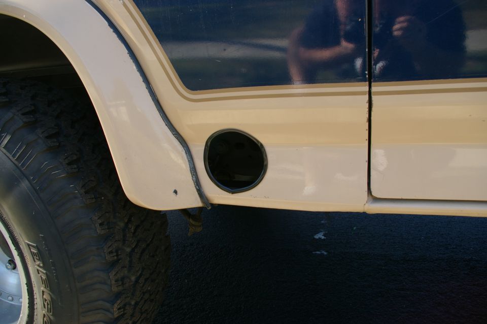 Close up of exhaust exit, I lined the hole with door jam weatherstripping