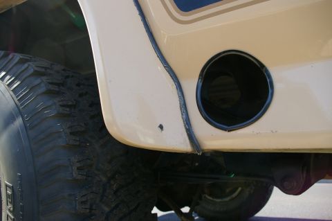 1986 Ford Bronco - hard to see, but this shows the inner and outer holes. the exhaust will run forward a little, but when it exits, it will be straight and ex…