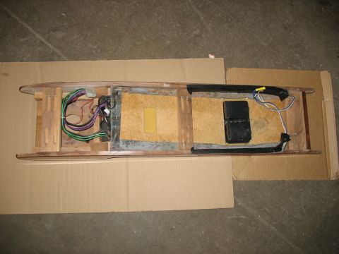 1995 Ford C-350 (Centurion Conversions) - Exposed wiring and electronic components within a vehicle's overhead console part.