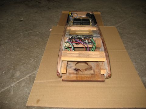 1995 Ford C-350 (Centurion Conversions) - Exposed wiring and components within a wooden housing, possibly an overhead console.