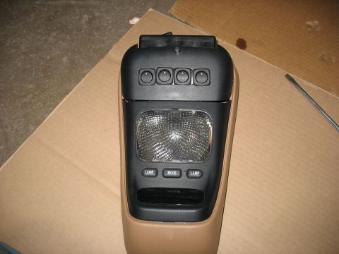 1995 Ford C-350 (Centurion Conversions) - Overhead console part with multiple buttons and a light fixture.