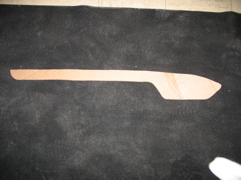 1995 Ford C-350 (Centurion Conversions) - A cardboard template is laid out on a black carpeted surface.