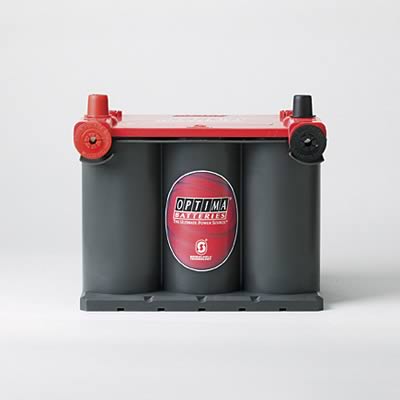 1995 Ford Bronco - Optima battery with red top and grey cylinders, the "OPTIMA BATTERIES" logo.