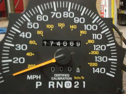 1992 Ford Crown Victoria - This gauge cluster shows a mileage of 174,069 and includes a speedometer and gear indicator.