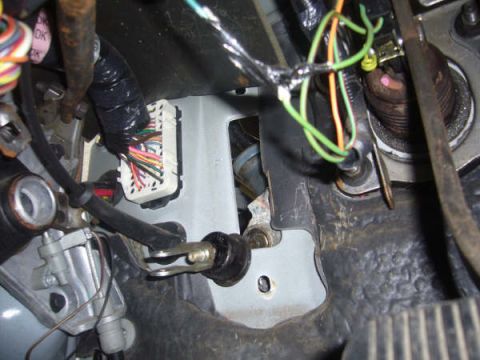 1996 Mercury Grand Marquis - Close-up view of the interior wiring harness and linkage, with some readable text visible.