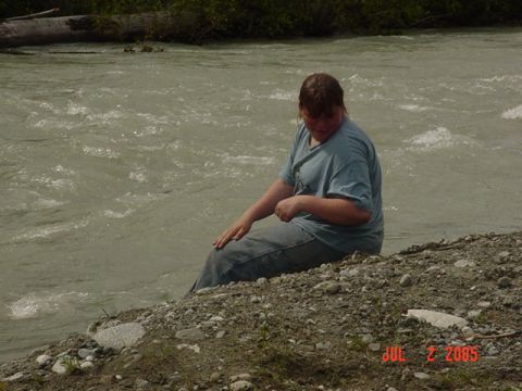 1978 Ford Bronco - A person sits on the bank of a turbulent river, with a date stamp indicating the photo was taken on July 2, 2005.