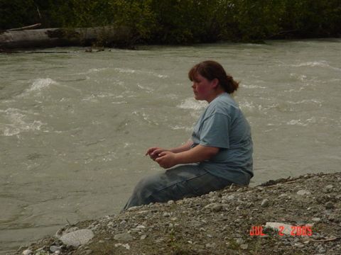 1978 Ford Bronco - A woman sits by a river, with a date stamp visible in the lower right corner.