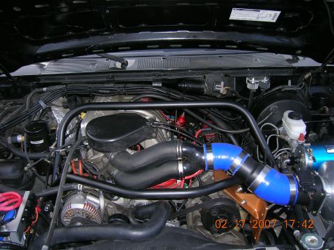 1996 Ford Bronco - Customized engine bay blue intake piping and a roll cage. The date stamp indicates it was photographed on February 17, 2007.