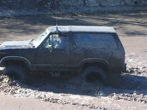 1996 Ford Bronco - This 1996 Ford Bronco is navigating a muddy water crossing.