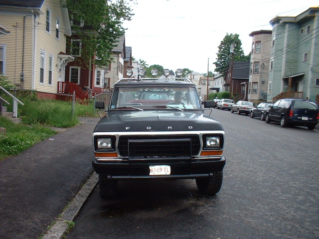 Front view of a 1979 Ford Bronco parked on a residential street