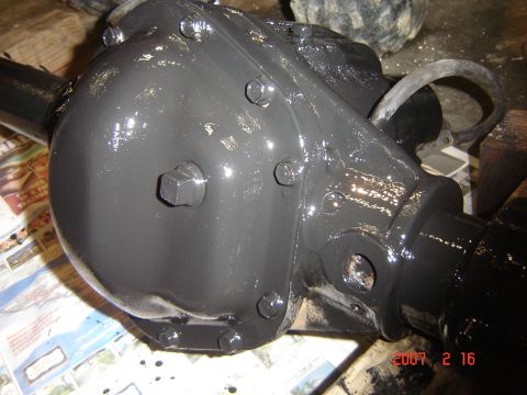 1993 Ford Bronco - This differential housing has been painted gray and appears to be part of a larger vehicle repair or restoration project.