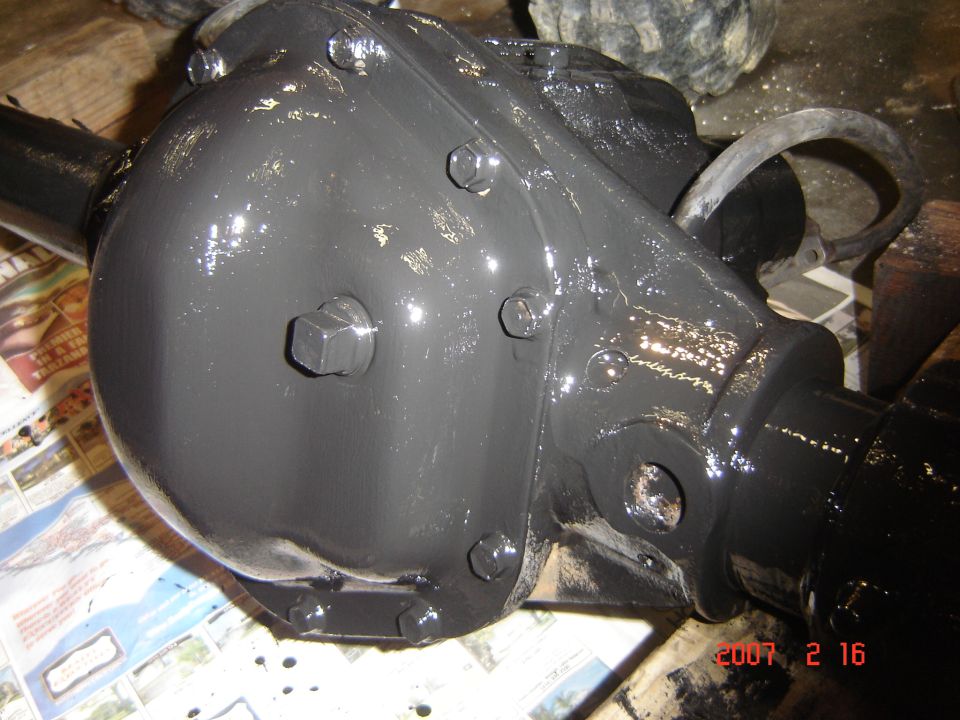 Close-up of a freshly painted differential housing, likely for a truck or SUV
