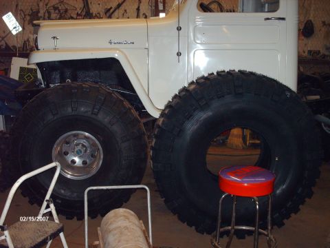 1990 Ford F-150 - 54 next to a mounted 47 ltb