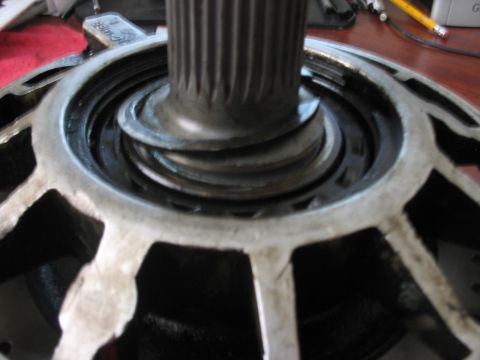 1991 Ford Bronco - A close-up view of a mechanical part, likely a bearing assembly with a splined shaft.