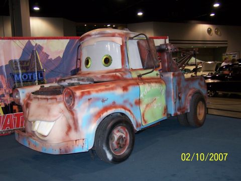 1979 Ford F-150 - This is a replica of the character Mater from the Disney/Pixar movie Cars, displayed indoors.